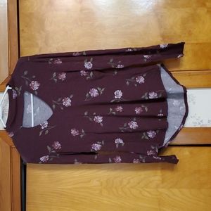 Long sleeve maroon top with keyhole neck line. Size medium